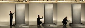 Song Dong painting in water on his work Traceless Stele, 2016. Photo ©️ Song Dong
