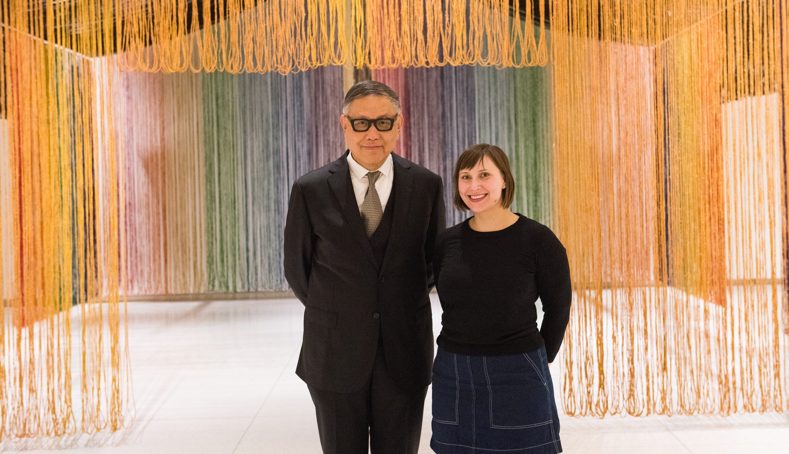 Wu Hung and Orianna Cacchione in front of gu wenda, united nations: american code, 1995–2019